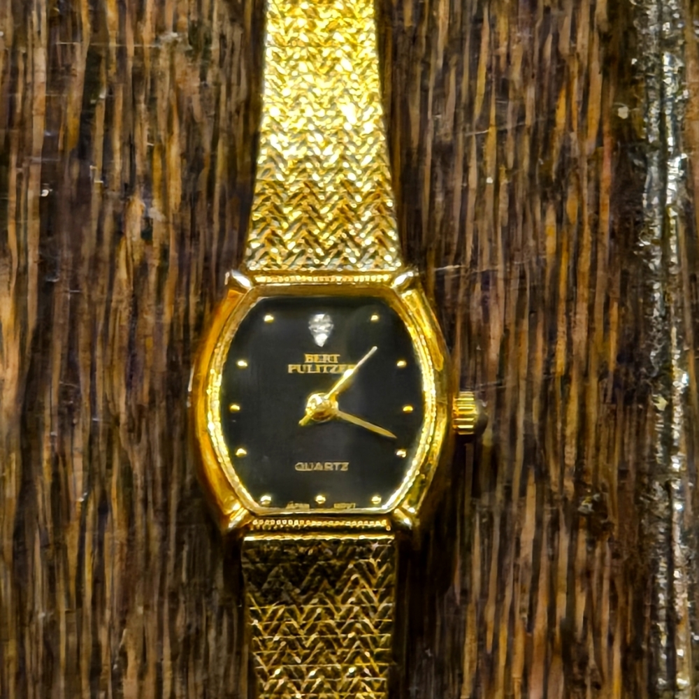 Vintage Bert Pulitz Gold and Black Quartz Watch